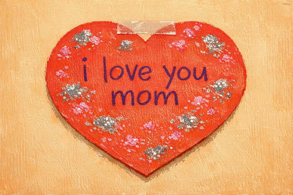 Keepsake Mother’s Day book page — a handmade red paper heart with glitter that reads “i love you mom”